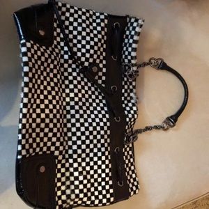 Black and white check leather and clad skin bag